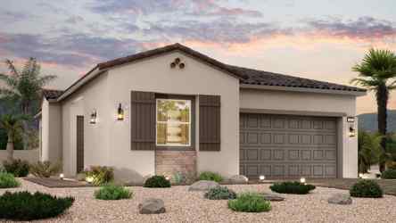 A house with a driveway and a gravel driveway.