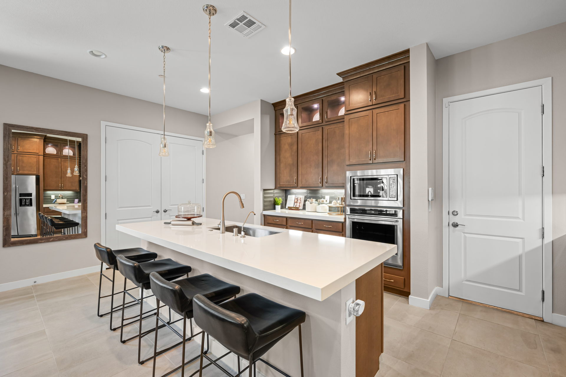 A kitchen with a stove and oven.