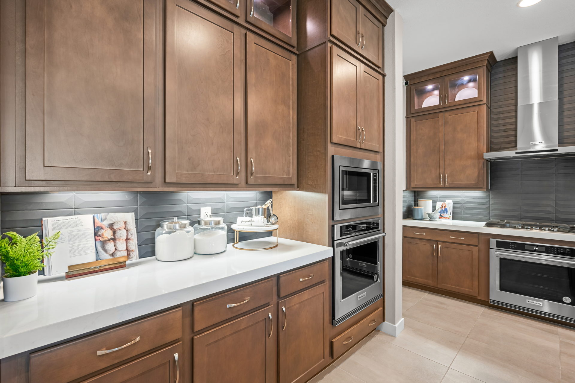 A kitchen with wooden cabinets.