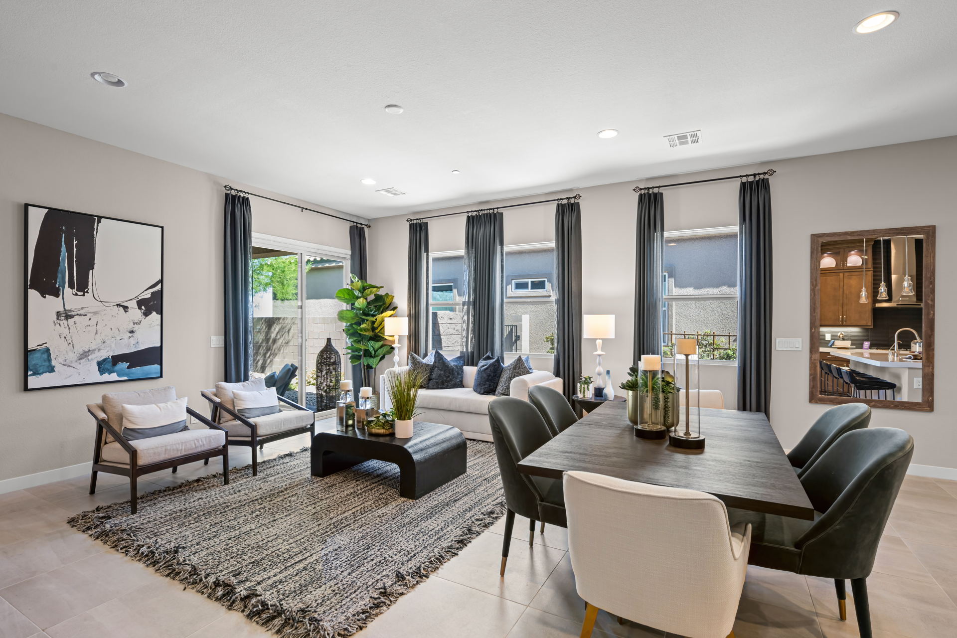 A room with a table and chairs.