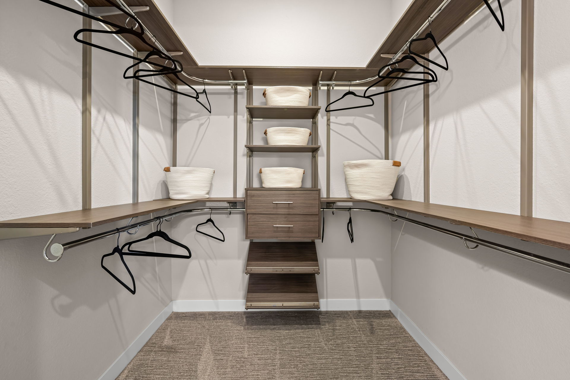 A room with shelves and a table.