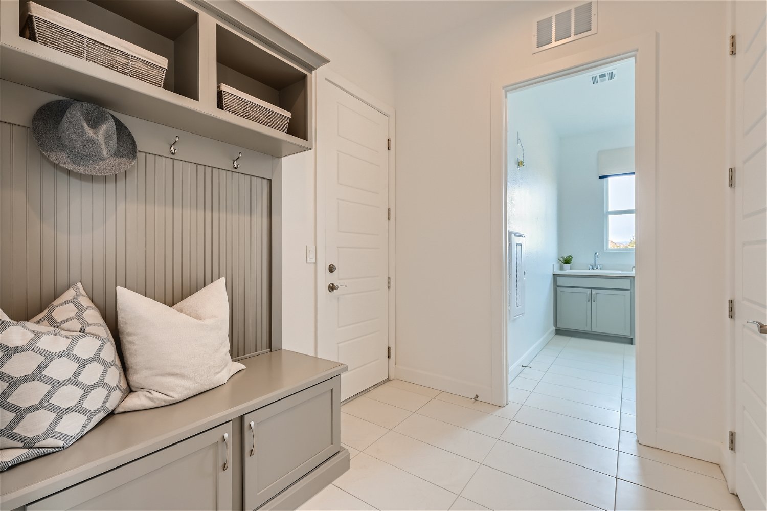 A room with a bed and a door.