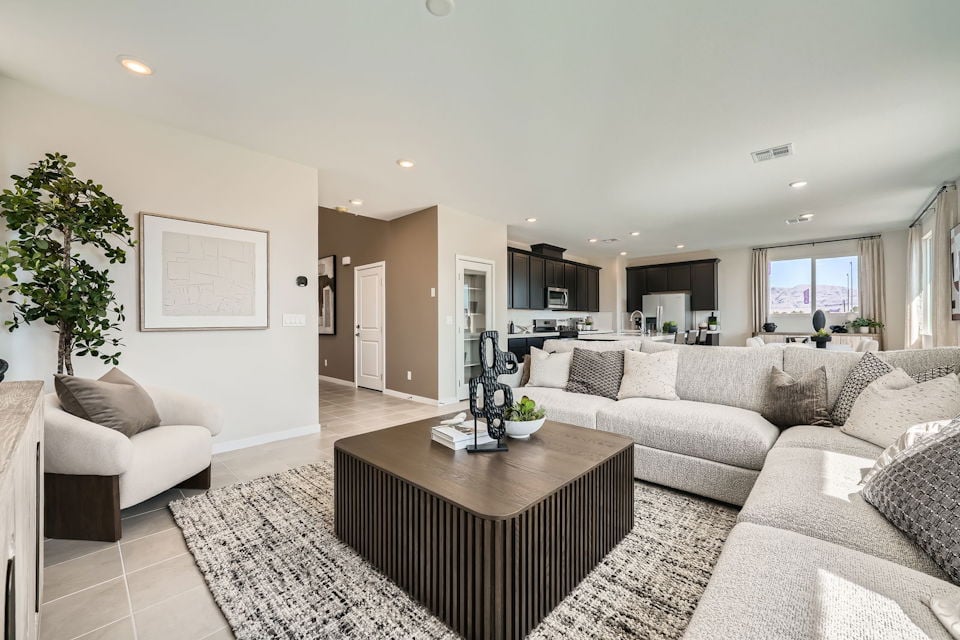 A living room with a couch and a coffee table.