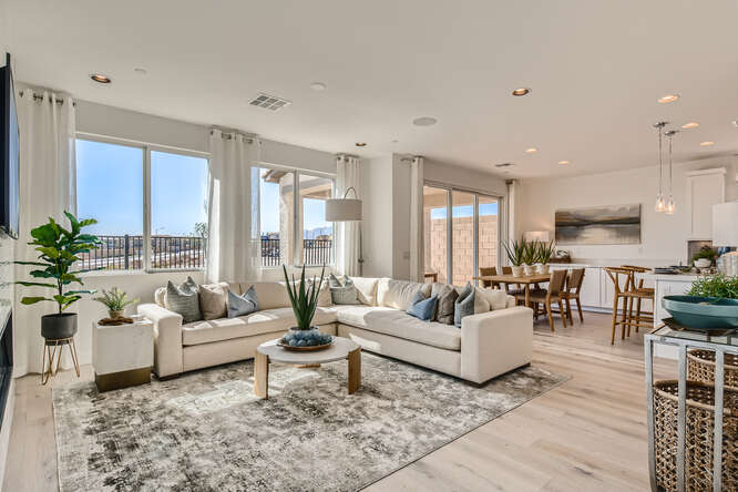 A living room with a large window.
