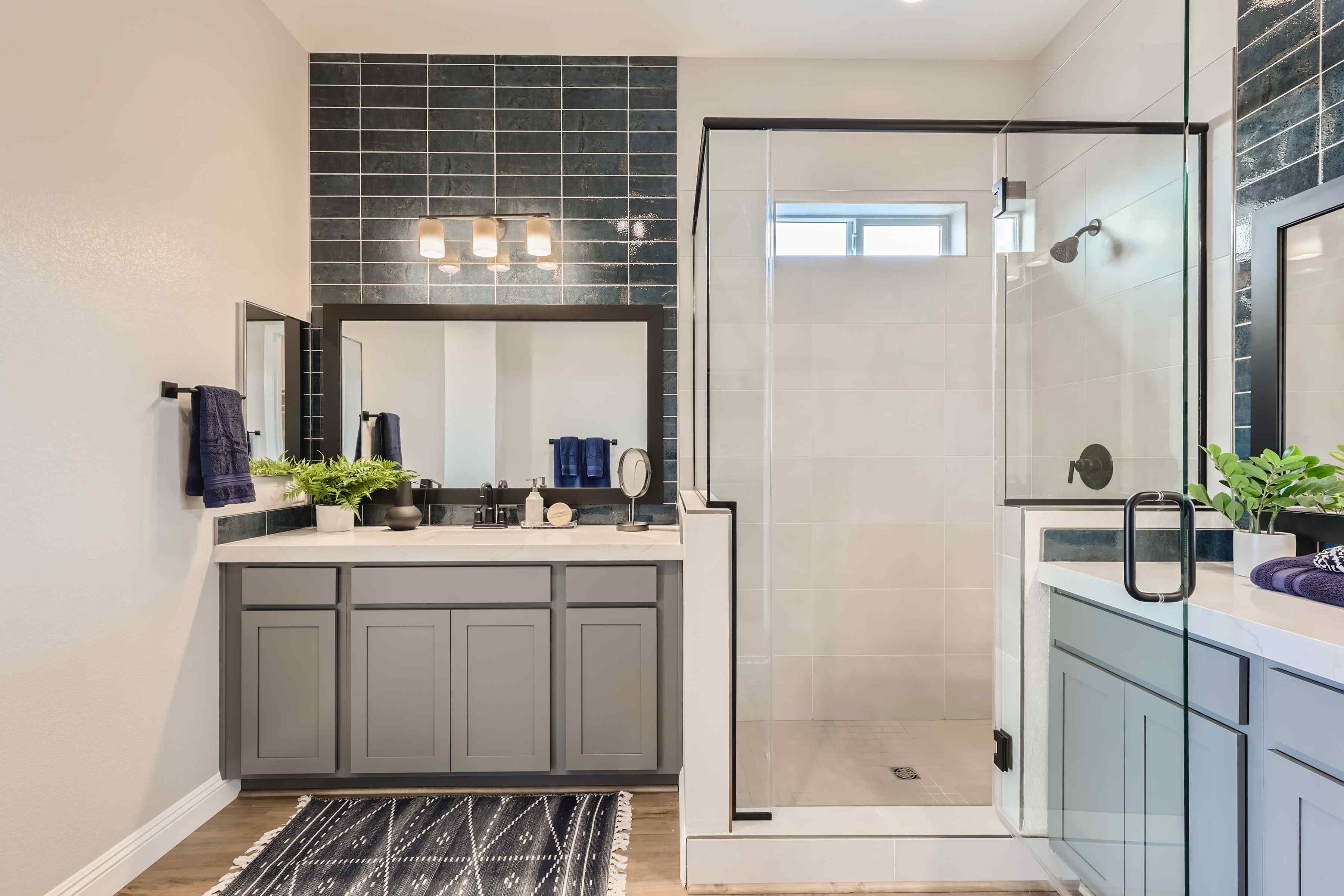 A bathroom with a glass shower.