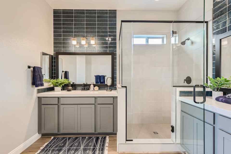 A bathroom with a glass shower.