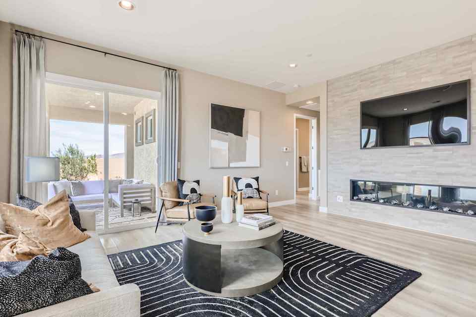 A living room with a large glass door.