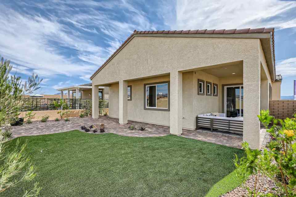 A house with a large front yard.