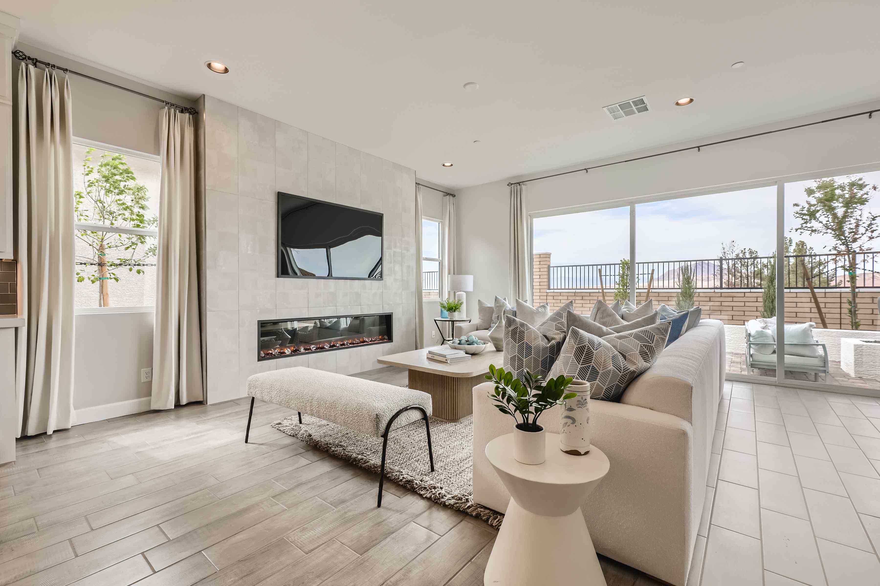 A living room with a fireplace.