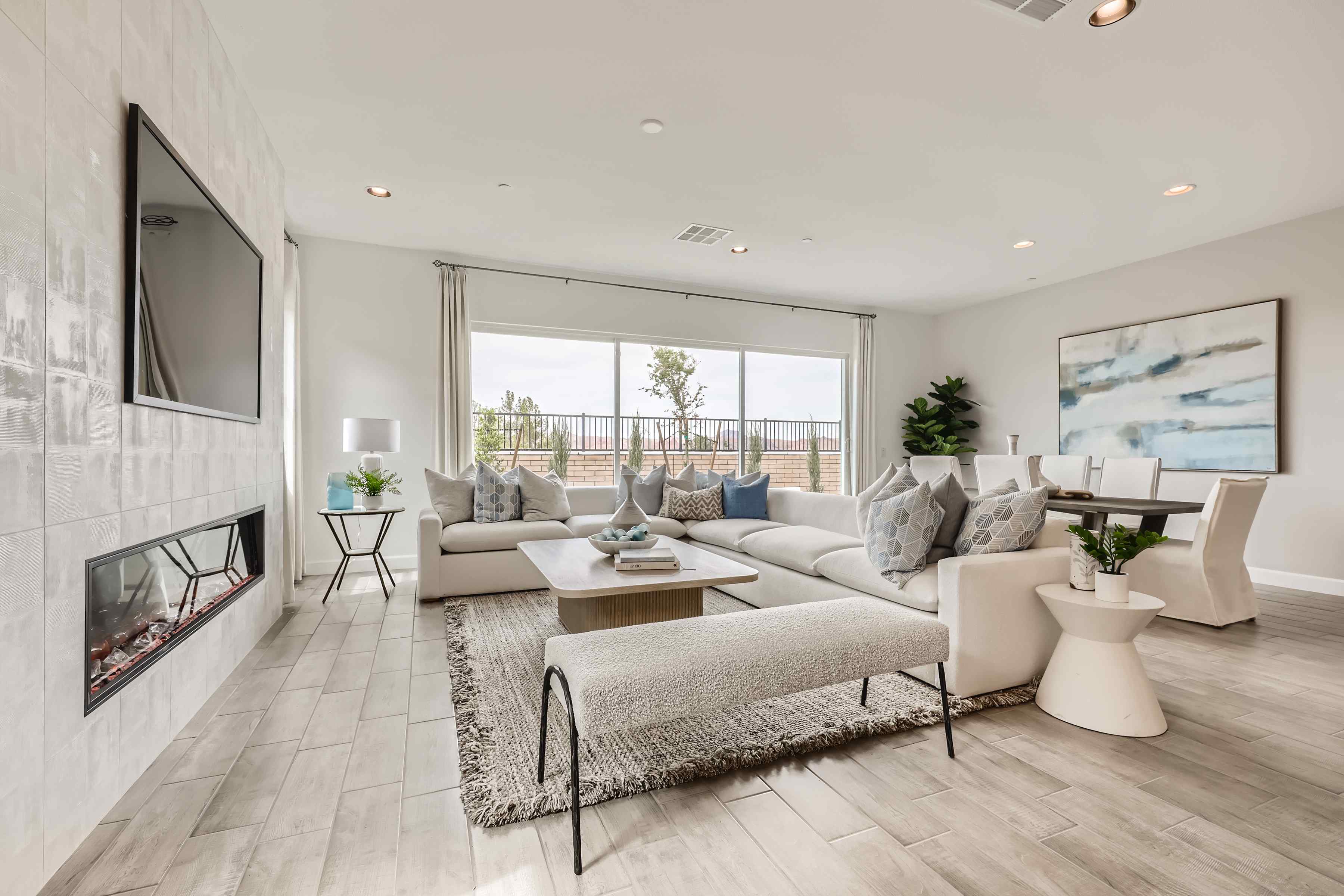 A living room with a large window.
