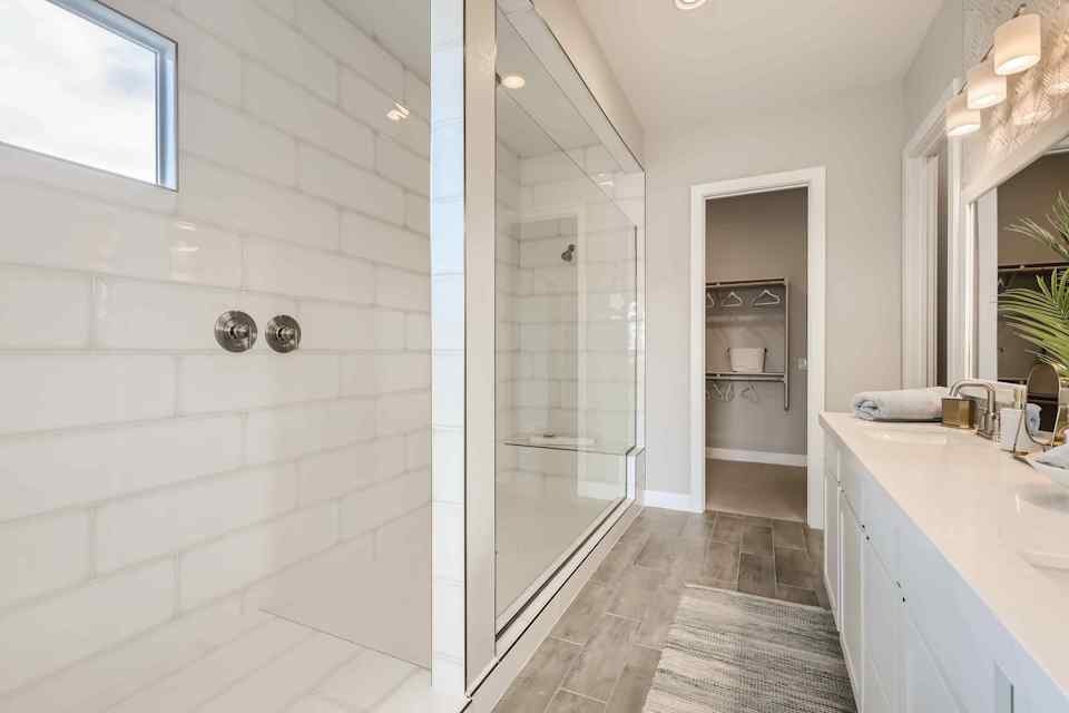 A bathroom with a glass shower.