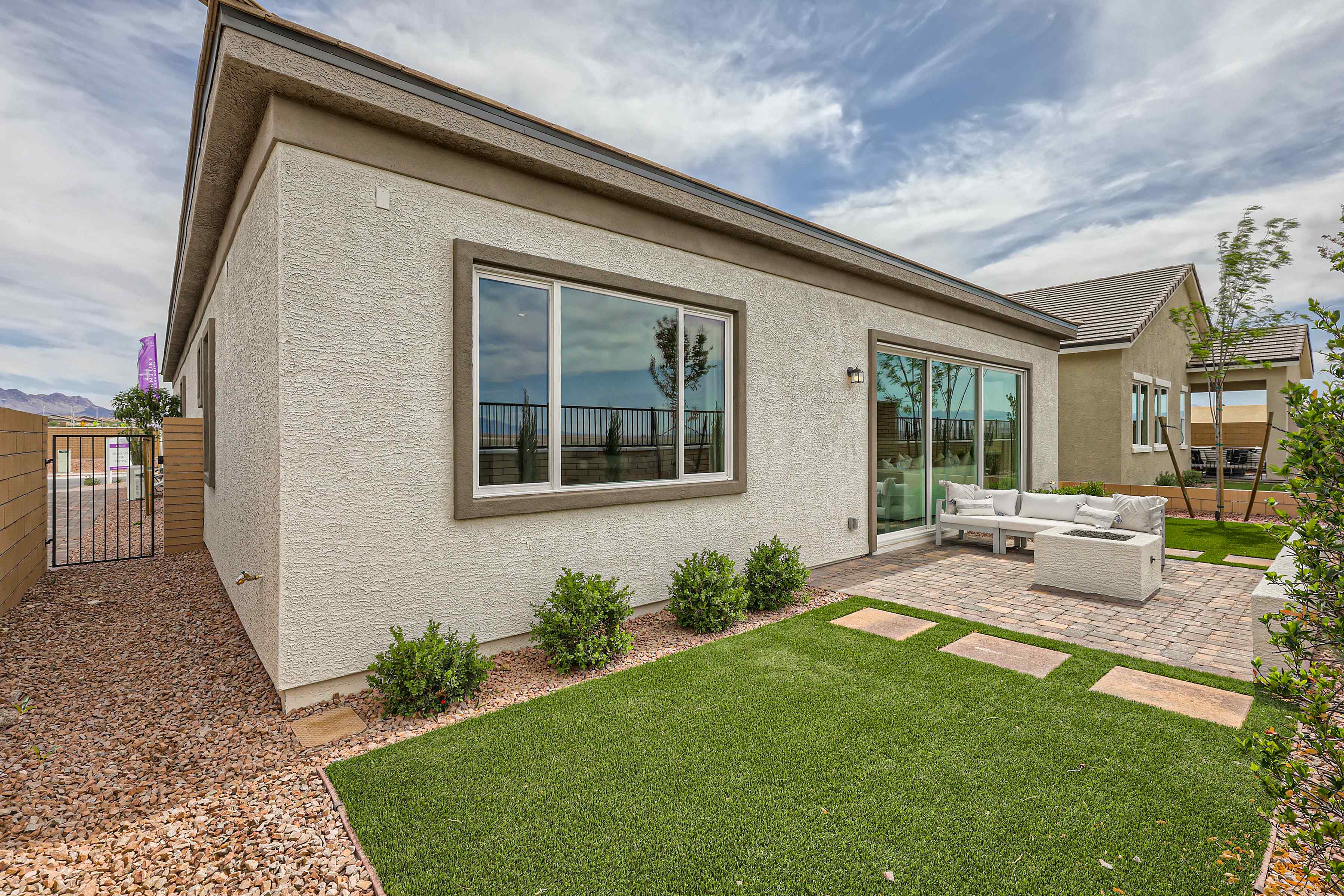 A house with a large front yard.