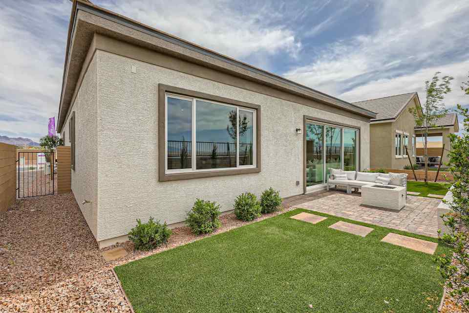 A house with a large front yard.