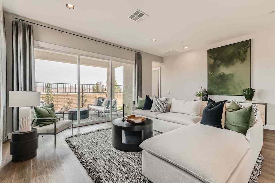 A living room with a large window.