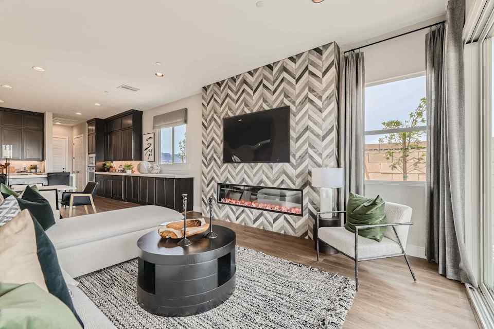 A living room with a fireplace.