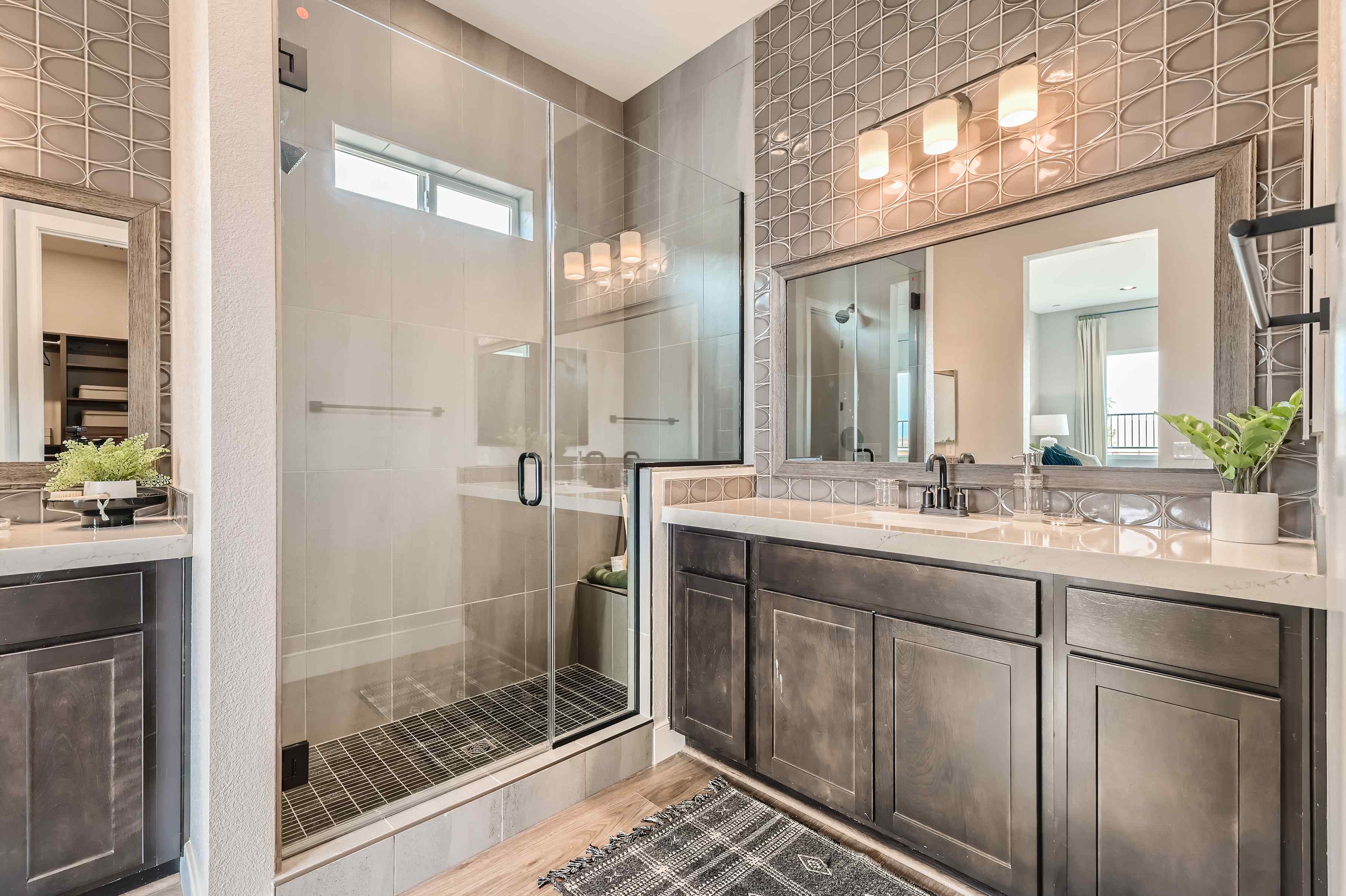 A bathroom with a glass shower.