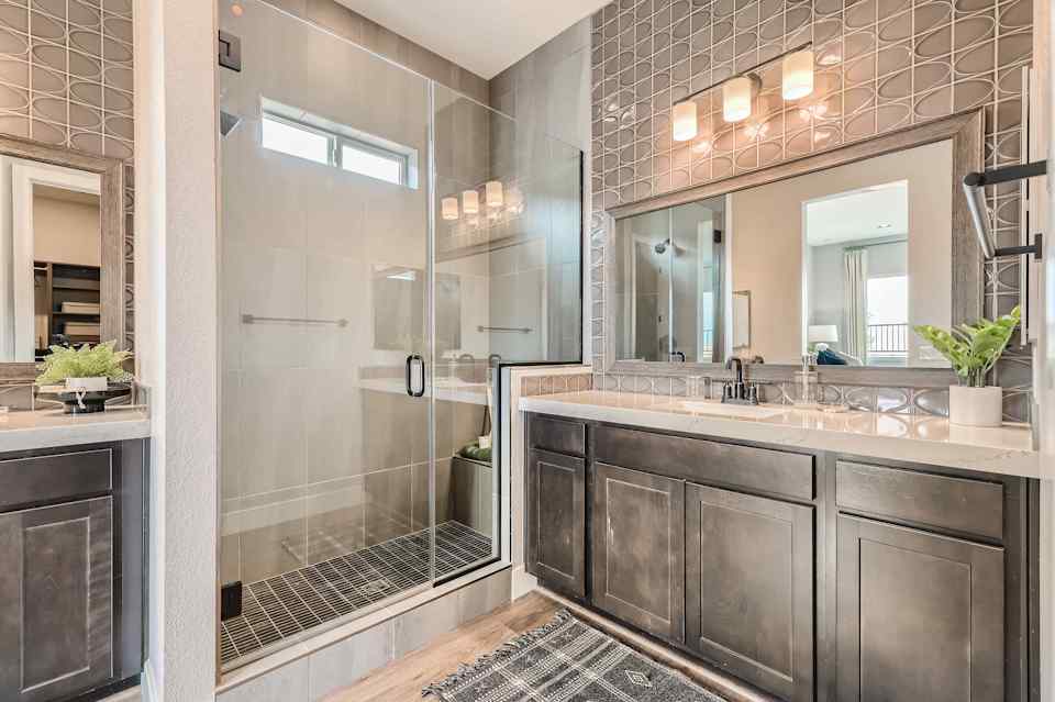 A bathroom with a glass shower.