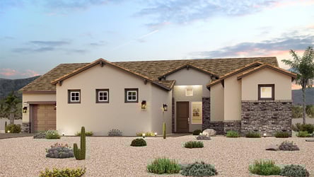 A house with a gravel driveway.
