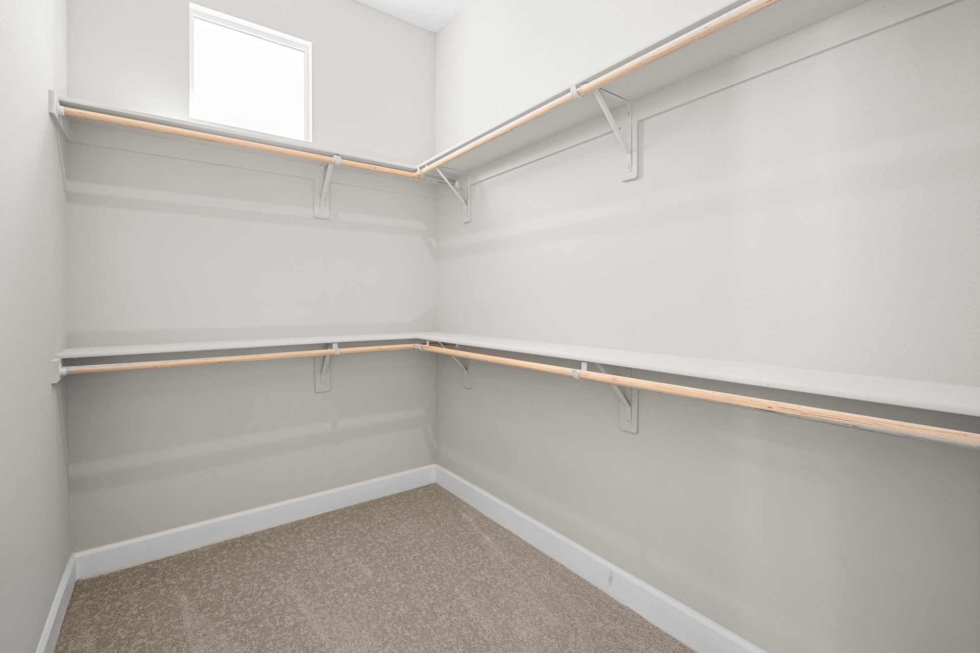 A white room with a white wall.