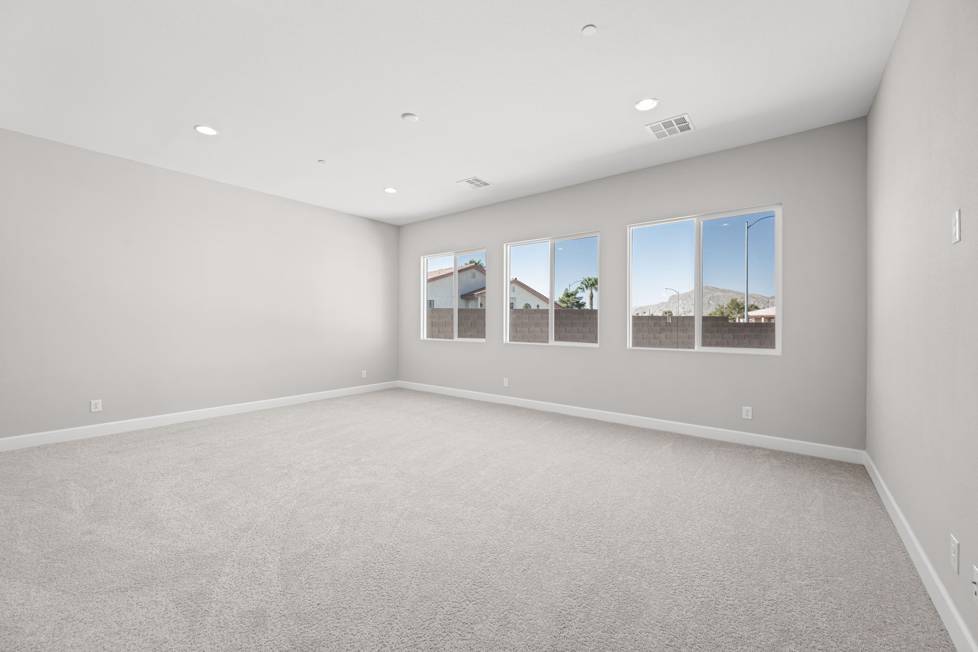 A room with a large window.