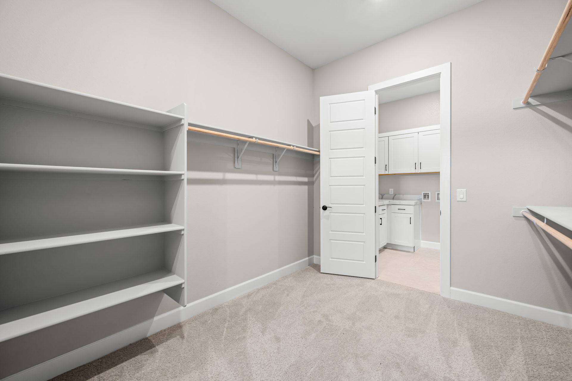 A room with white cabinets.