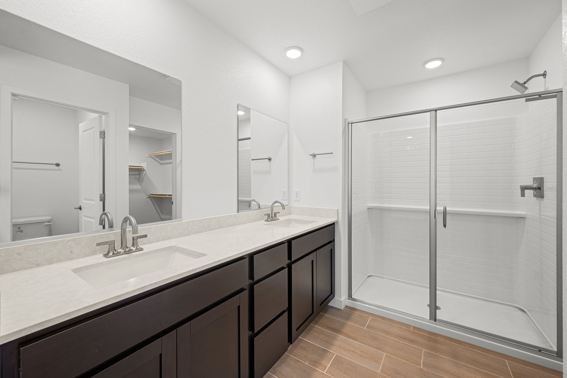 A bathroom with a glass shower.
