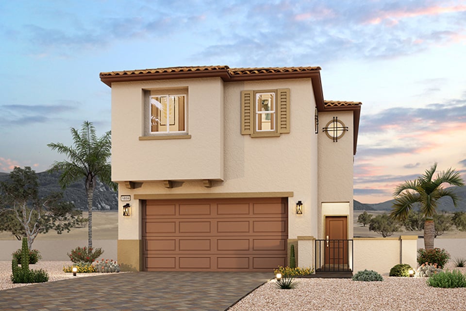 A house with a garage and palm trees.