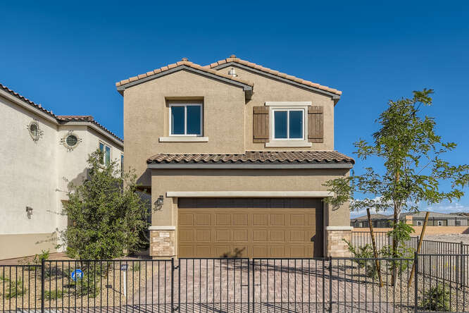 A house with a fence around it.