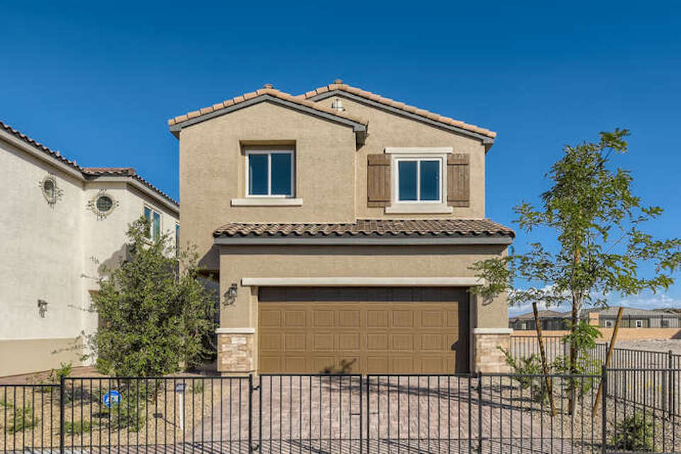 A house with a fence around it.