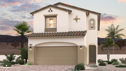 A house with a garage and palm trees.