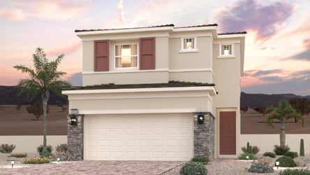 A white house with a driveway.