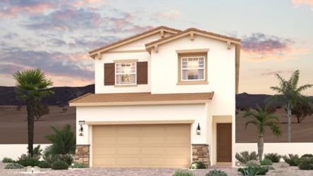 A house with palm trees and a sunset in the background.