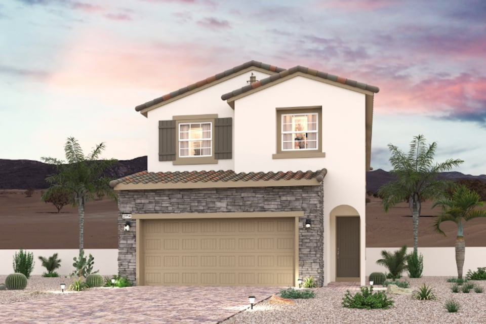 A house with a garage and palm trees.