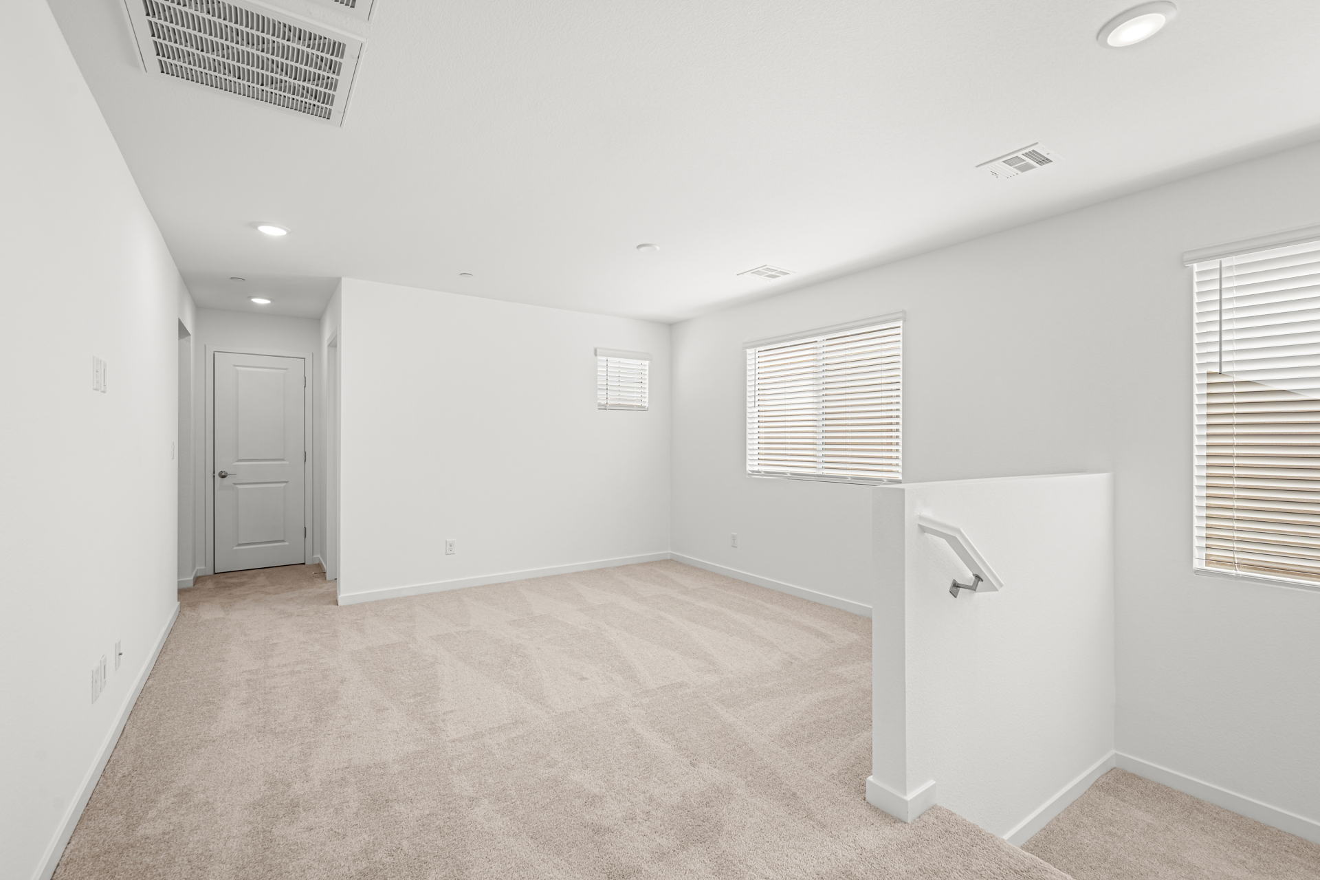 A room with a door and a window.