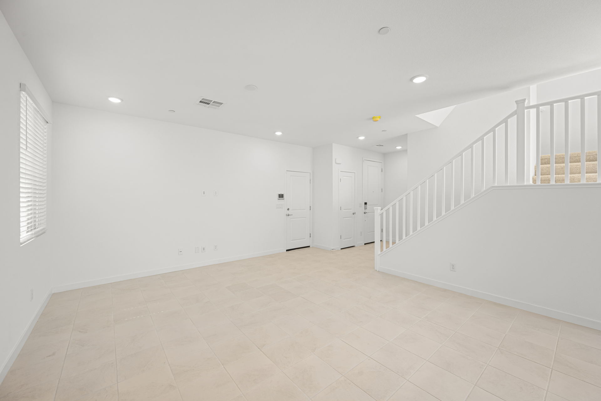A white hallway with white walls.