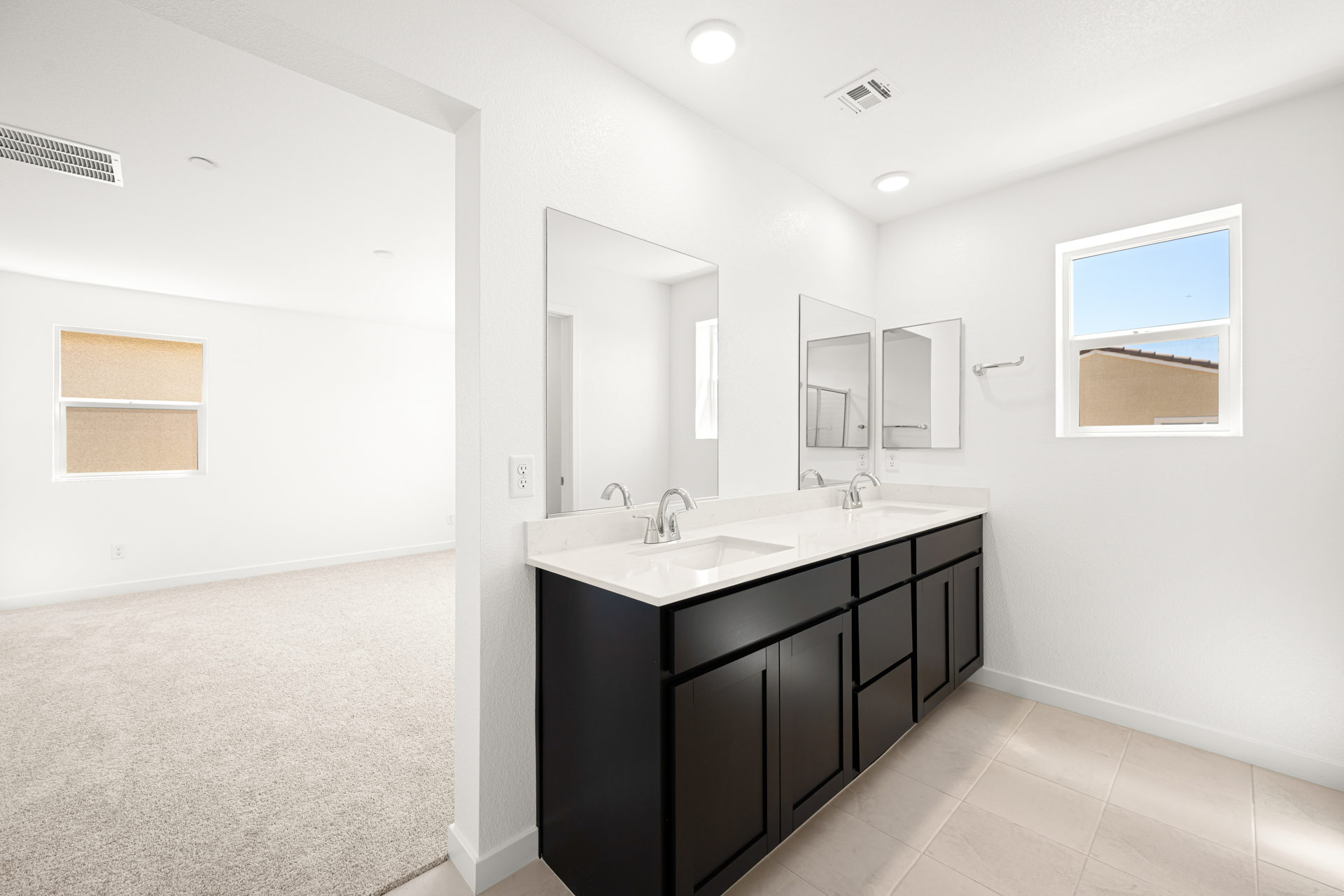 A bathroom with a sink and mirror.