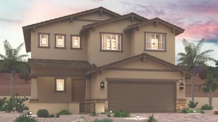 A house with a garage and trees.