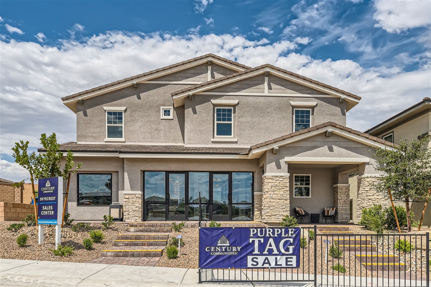 A building with a sign in front.