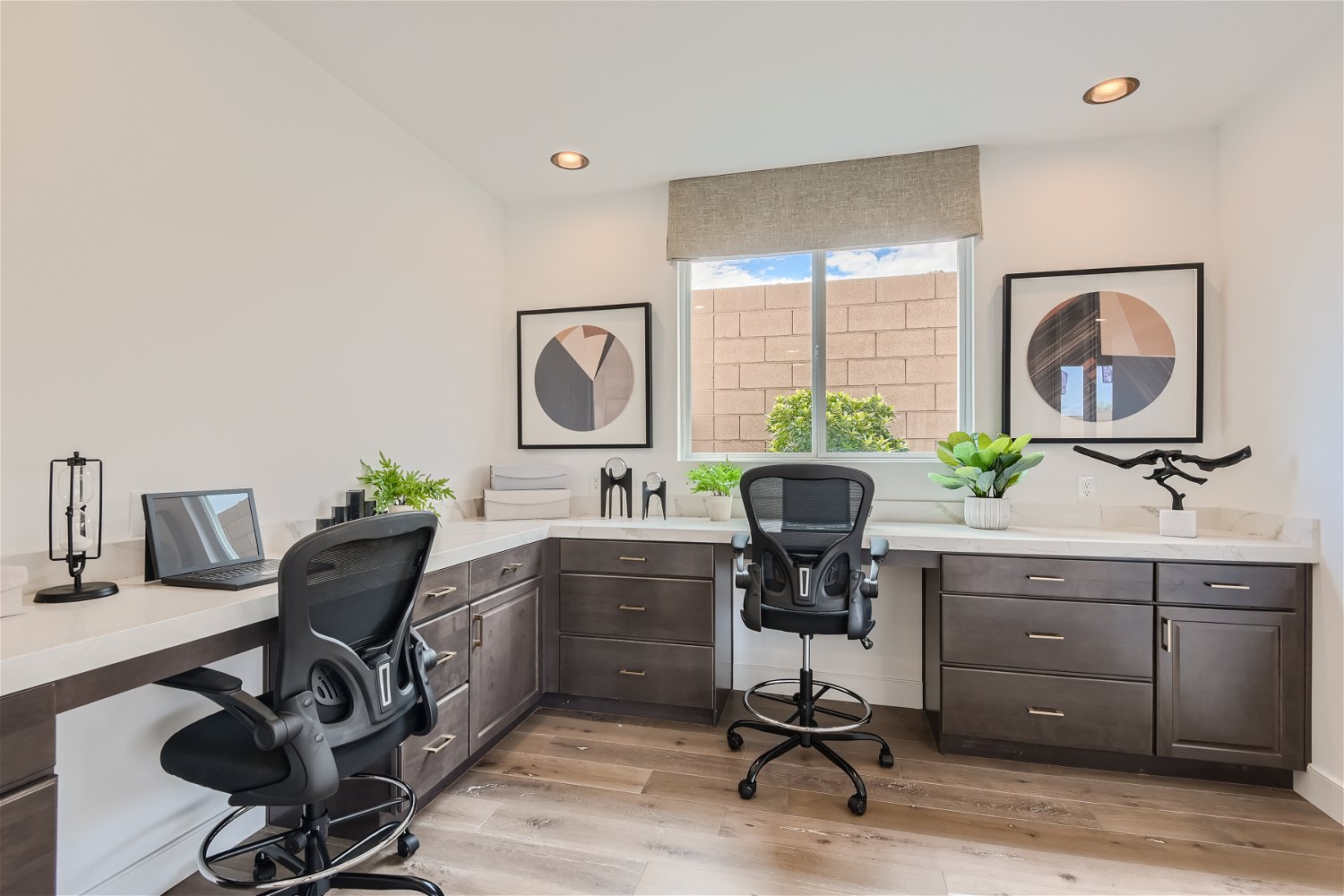 A room with a desk and a chair.