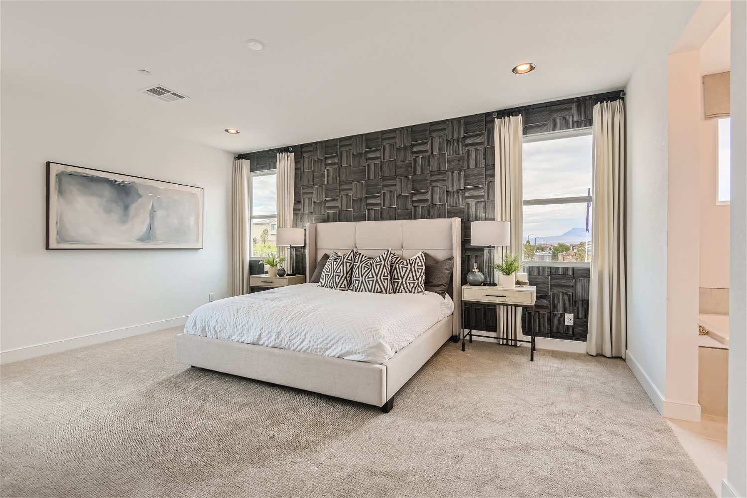 A bedroom with two beds.