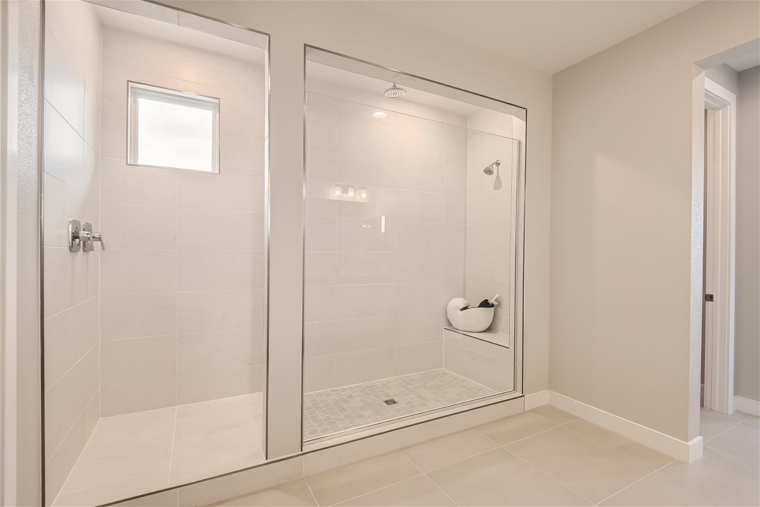 A bathroom with a glass shower.