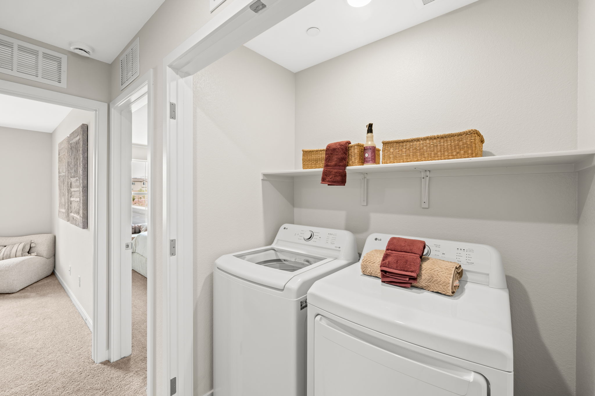 A laundry room with a washer and dryer.