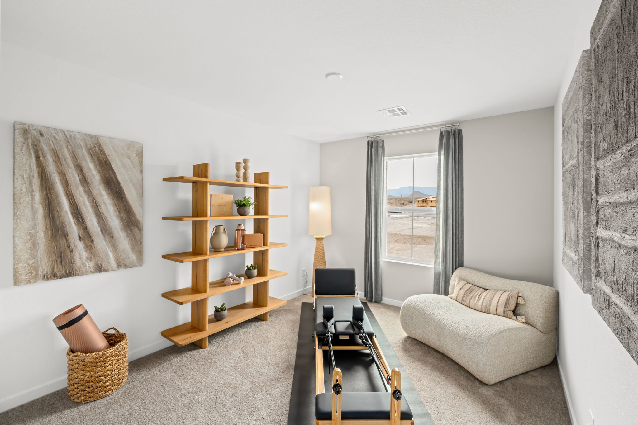 A living room with a couch and a table.