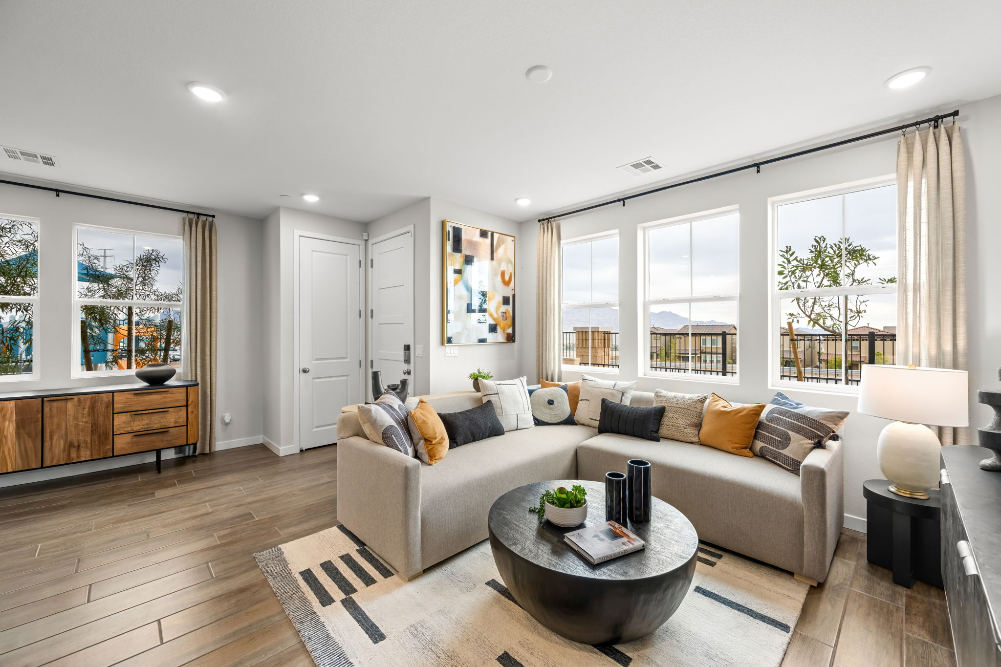 A living room with a large window.