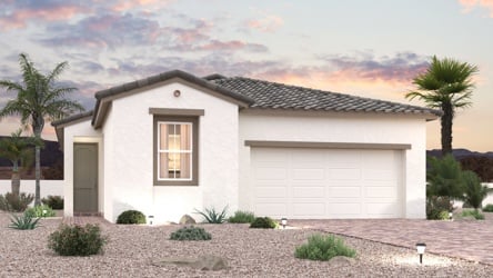 A house with a driveway and trees.