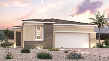 A house with a garage and trees.