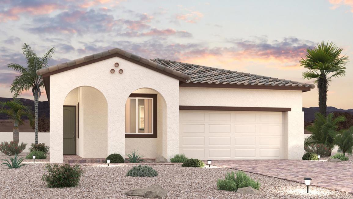 A house with a garage and palm trees.