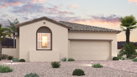 A house with a garage and trees.