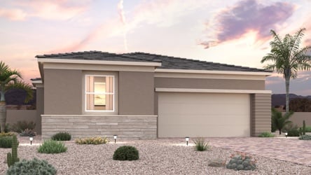 A house with a garage and trees.