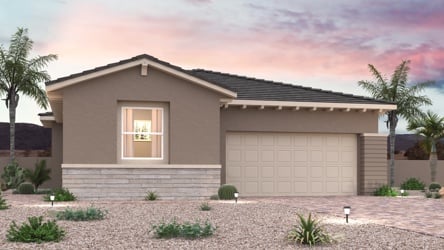 A house with a garage and trees.